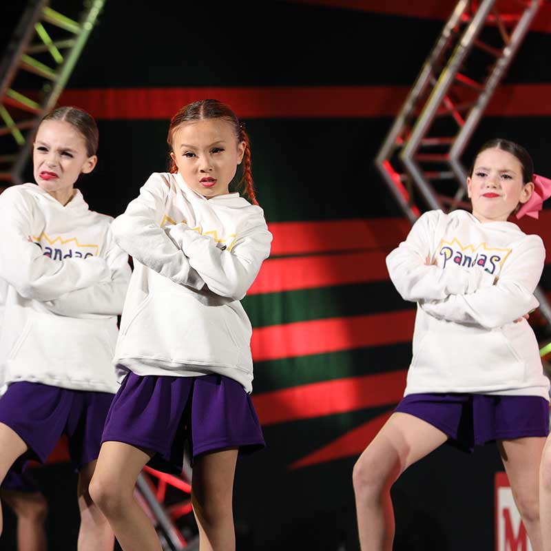 Girls dance team in competition routine